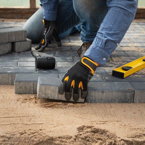 block paving installation with sand foundation layer